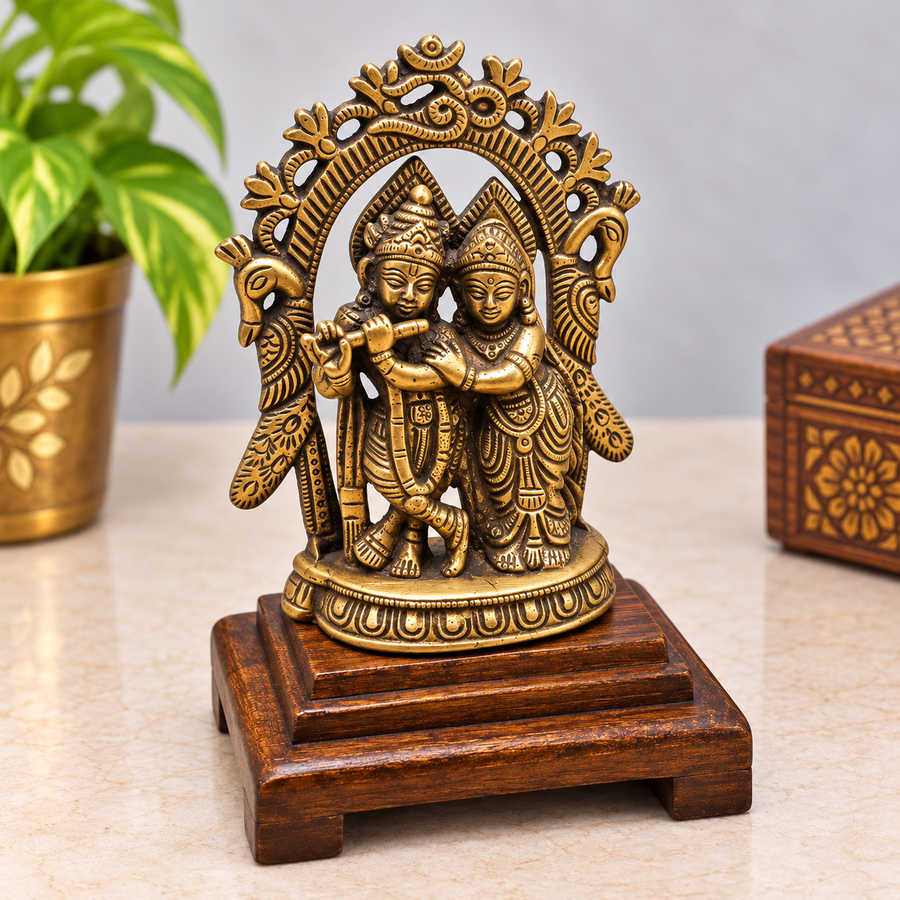 Handcrafted brass Radha Krishna statue with flute on wooden base, front view