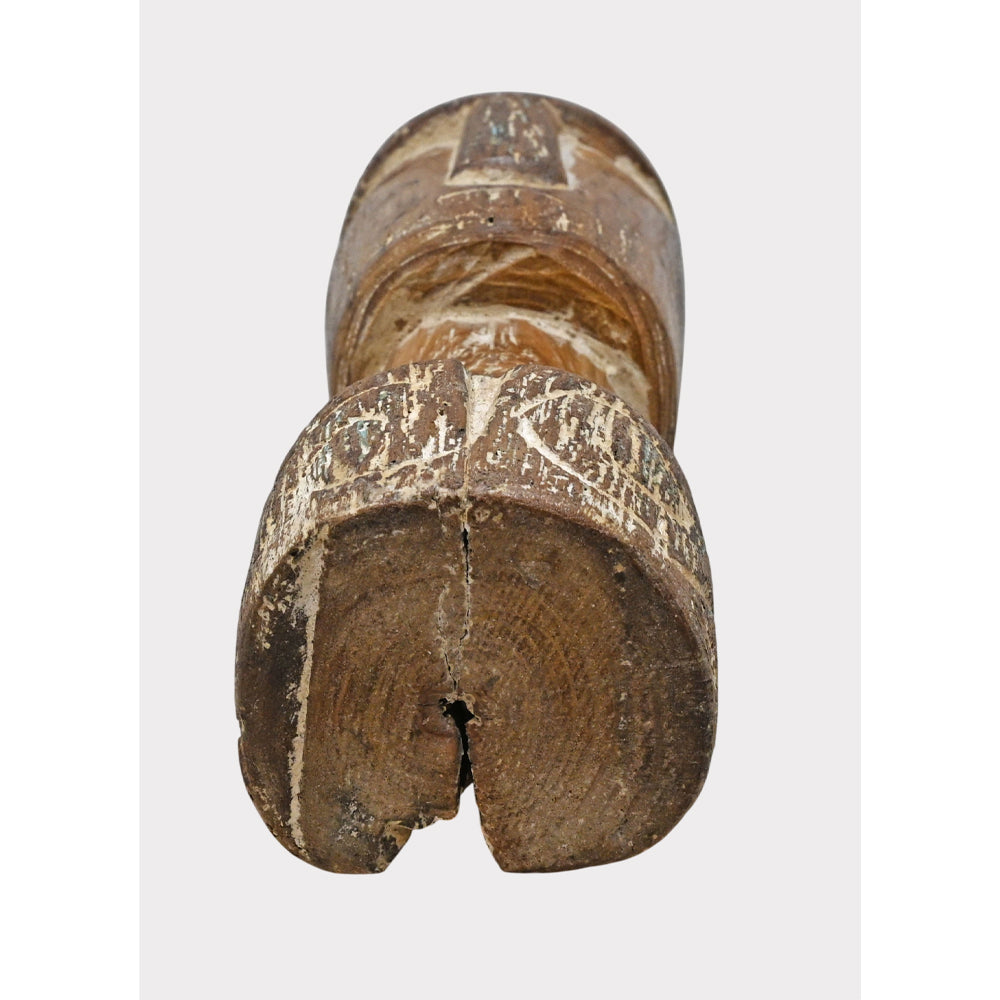 Rustic tribal wooden head sculpture, carved texture detail