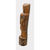 Vintage tribal wooden face sculpture, side detail