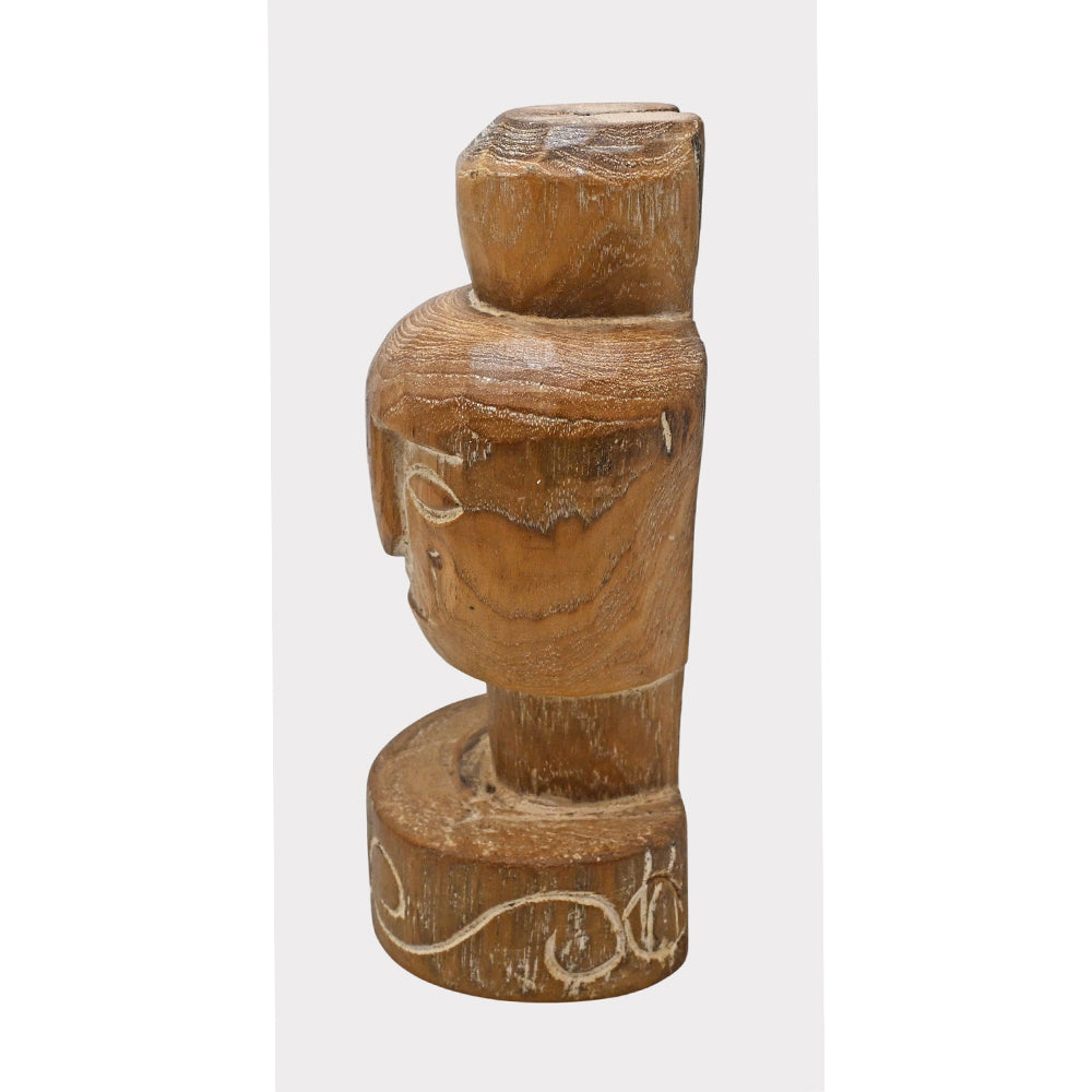 Close-up of carved teak wooden face details