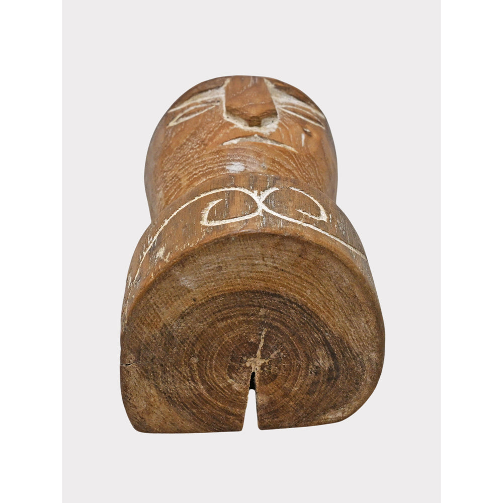 Natural teak tribal face statue, side view