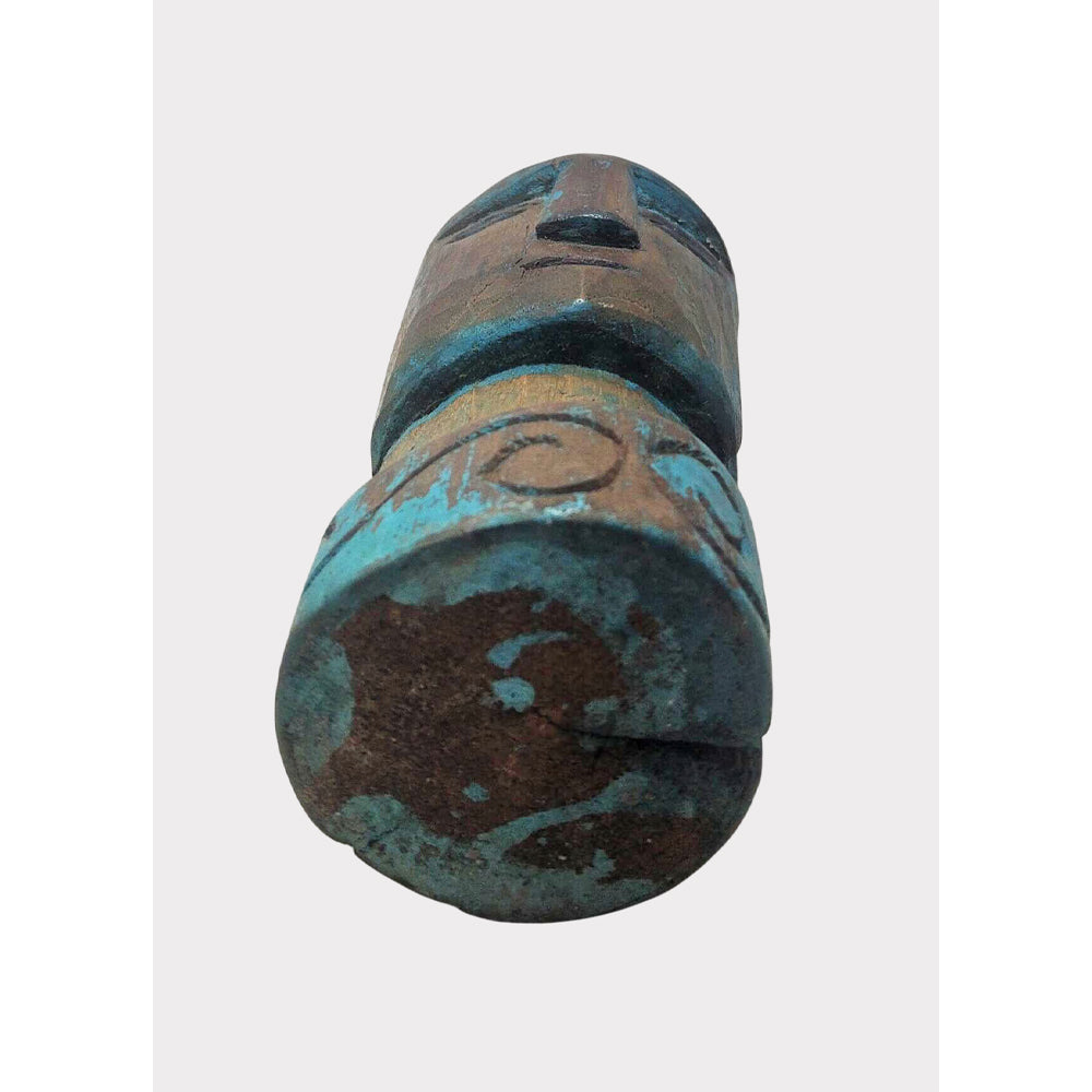 Wooden tribal face sculpture, side profile