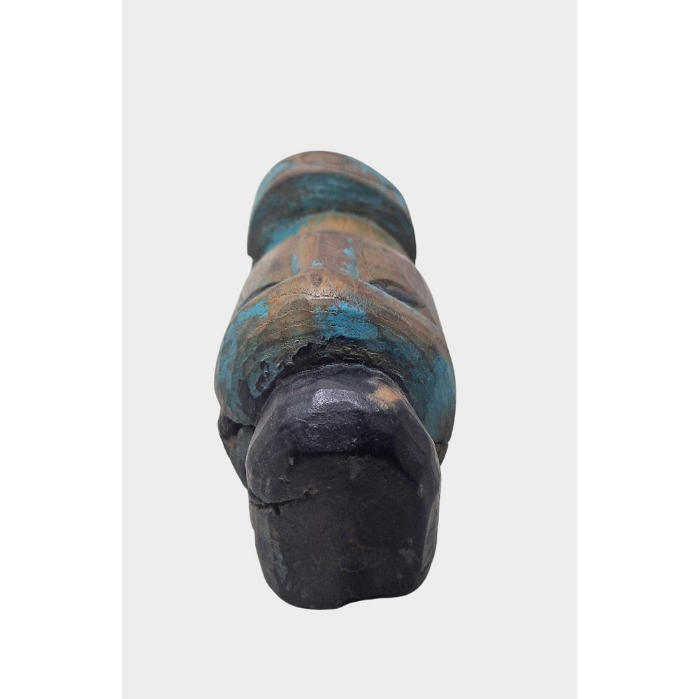 Turquoise walnut sculpture showing carved details