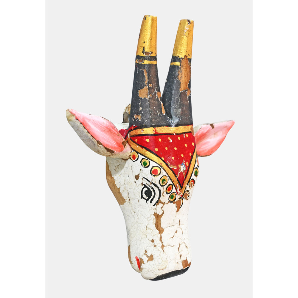Red and white cow head key holder, angled view