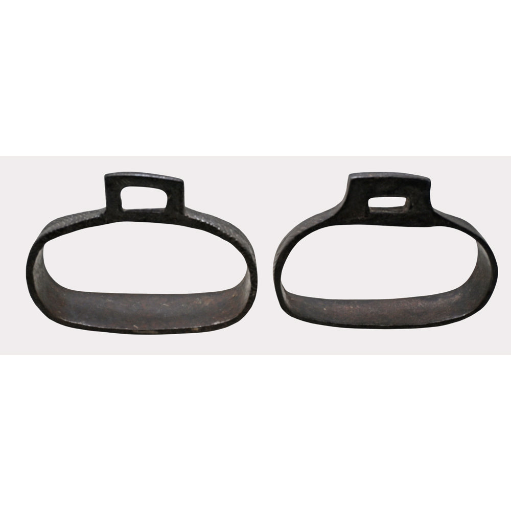 Antique wrought iron riding stirrups, angled view