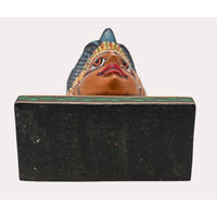 Hand-painted Nag Devta idol showing colorful details
