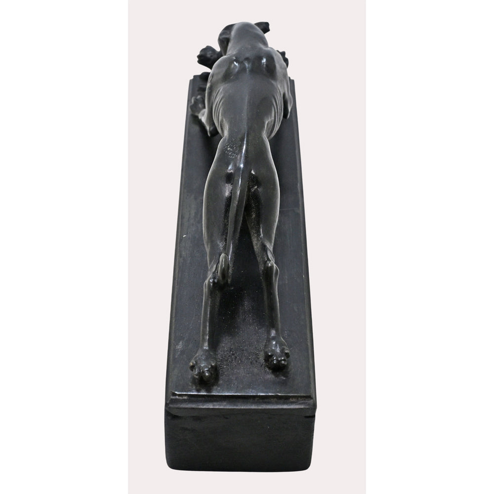 Black stone running dog sculpture, angled view