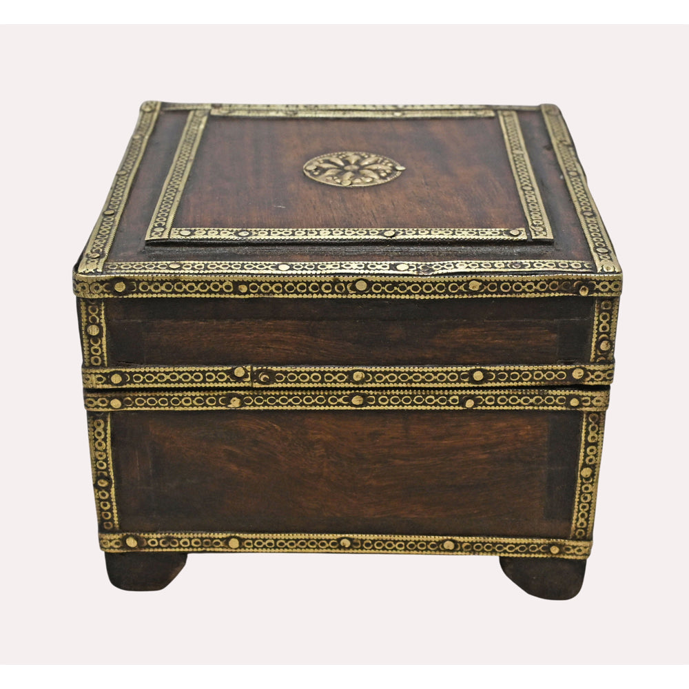 Close-up of brass decoration on wooden keepsake box