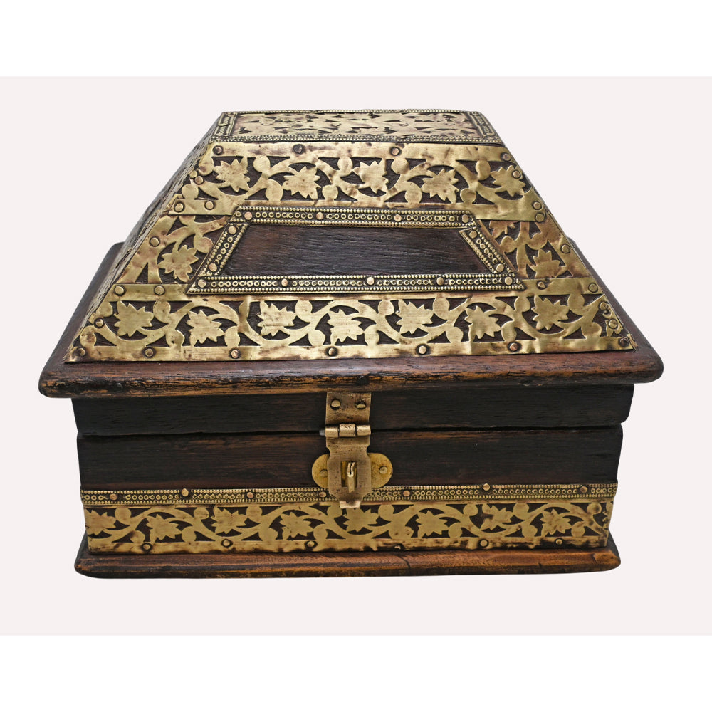 Wooden jewellery box with ornate brass floral decoration, angled view