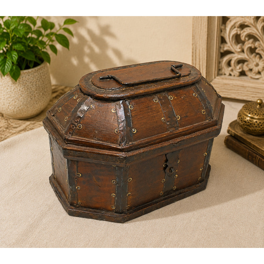 Octagonal dome wooden jewellery box with brass and iron motifs, front view