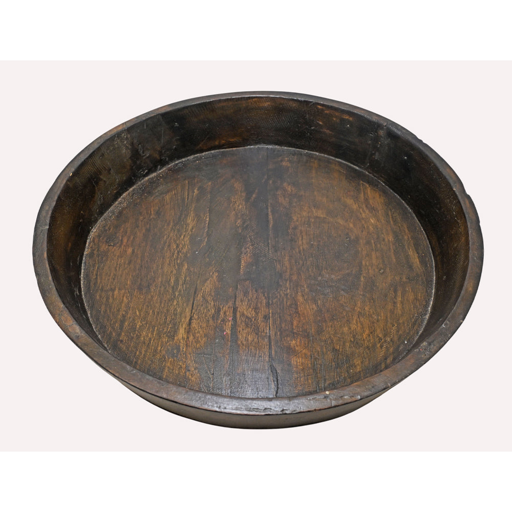 Close-up of carved details on wooden parat bowl