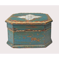 Close-up of inlay and brass decoration on turquoise box