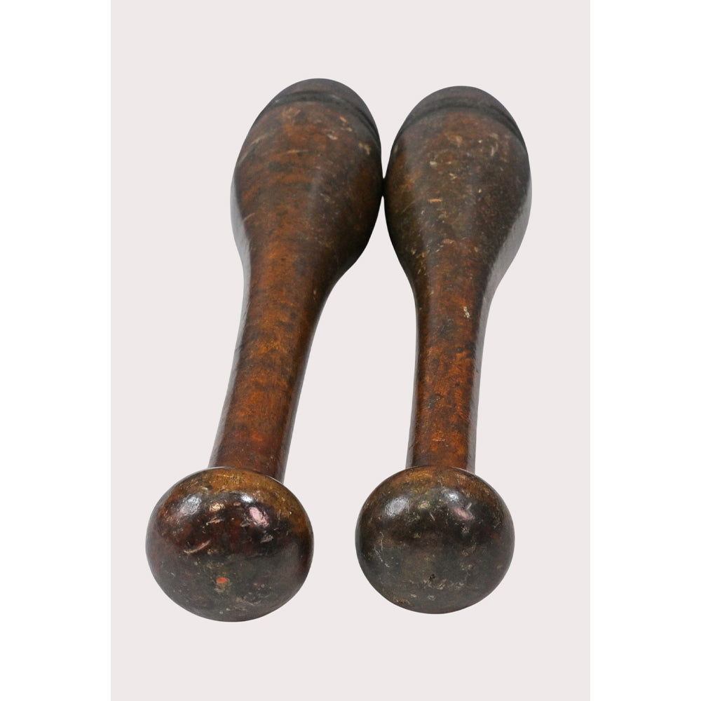 Side view of handcrafted wooden fitness weights