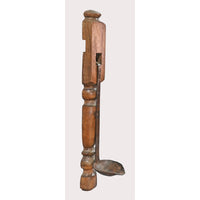 Wooden wall candle holder with iron cup, angled view