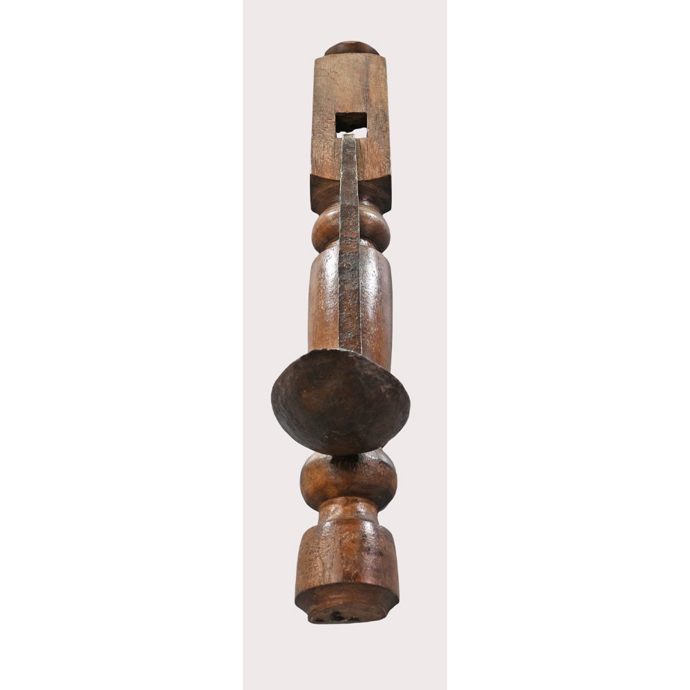 Side view of handcrafted wooden wall candle stand