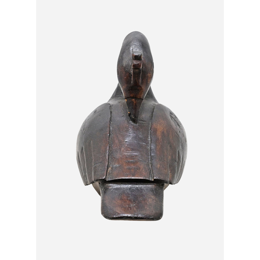 Side view of vintage painted wooden duck figurine