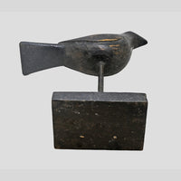 Black antique wooden bird figurine on stand, alternate view
