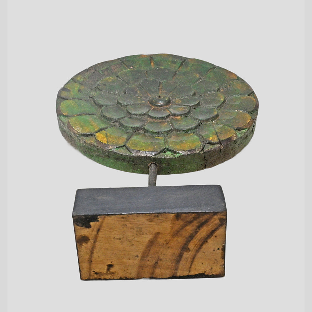 Alternate view of vintage green carved wooden medallion on base