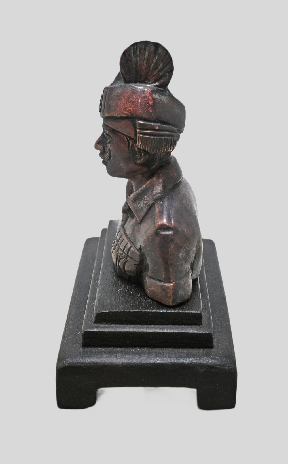 Close-up of face and uniform details on brass soldier bust
