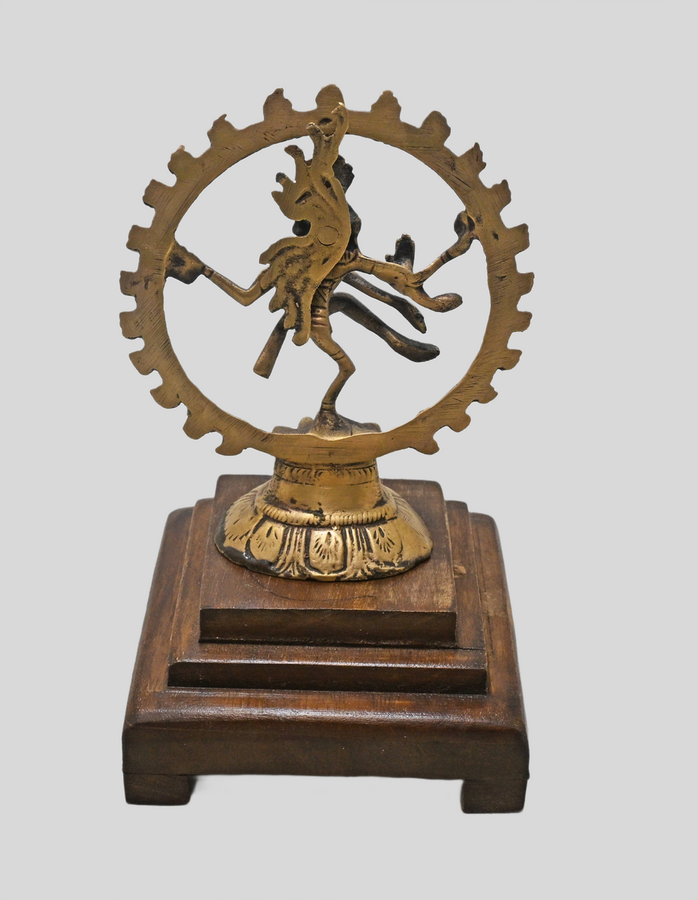 Brass Nataraja statue showing wooden Bajot base