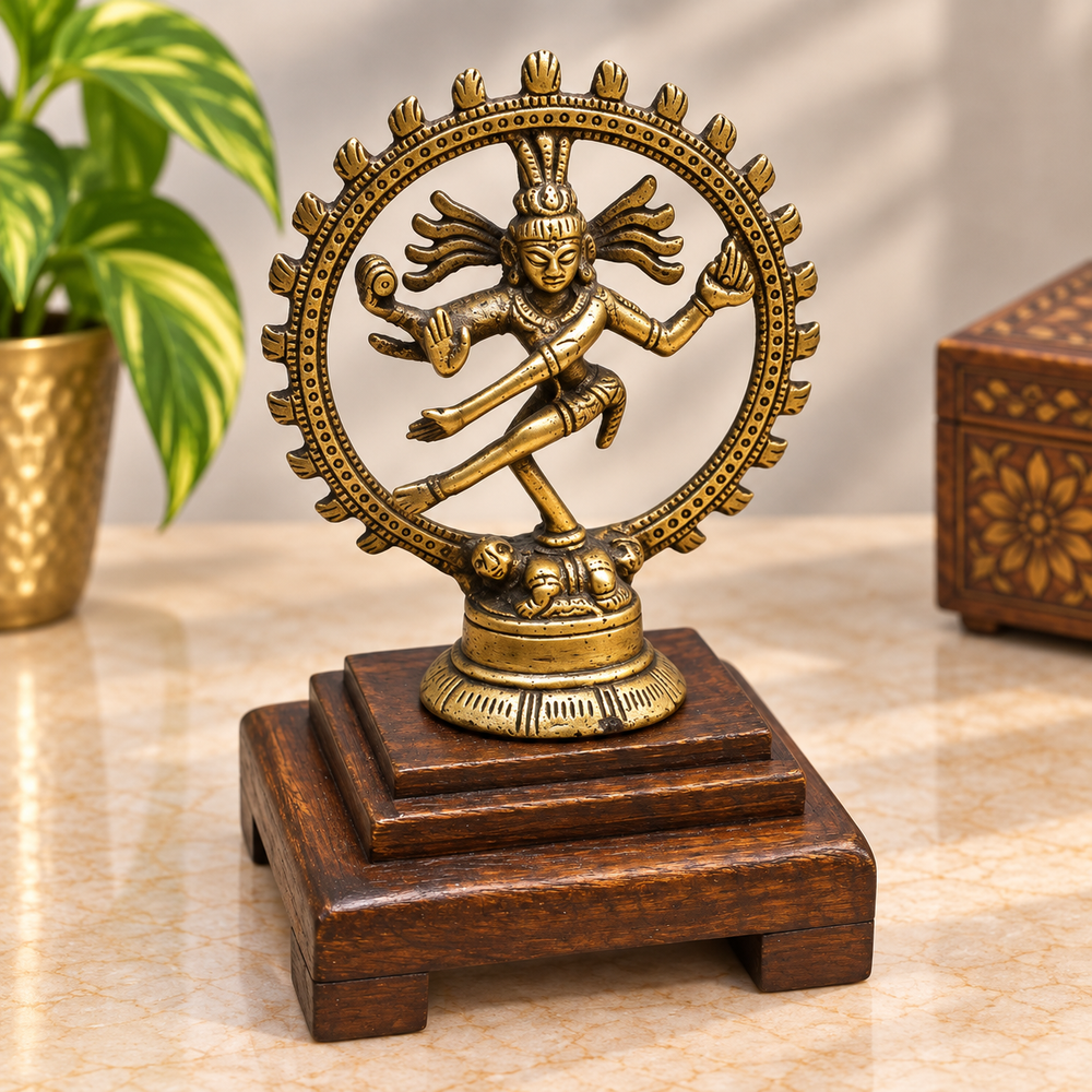 Brass Nataraja dancing Lord Shiva statue on wooden Bajot base, front view