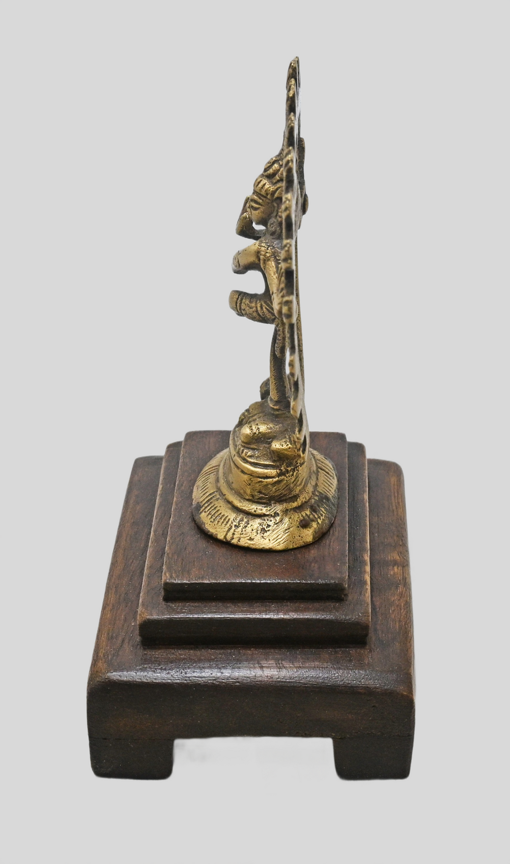 Brass Nataraja statue showing wooden Bajot base