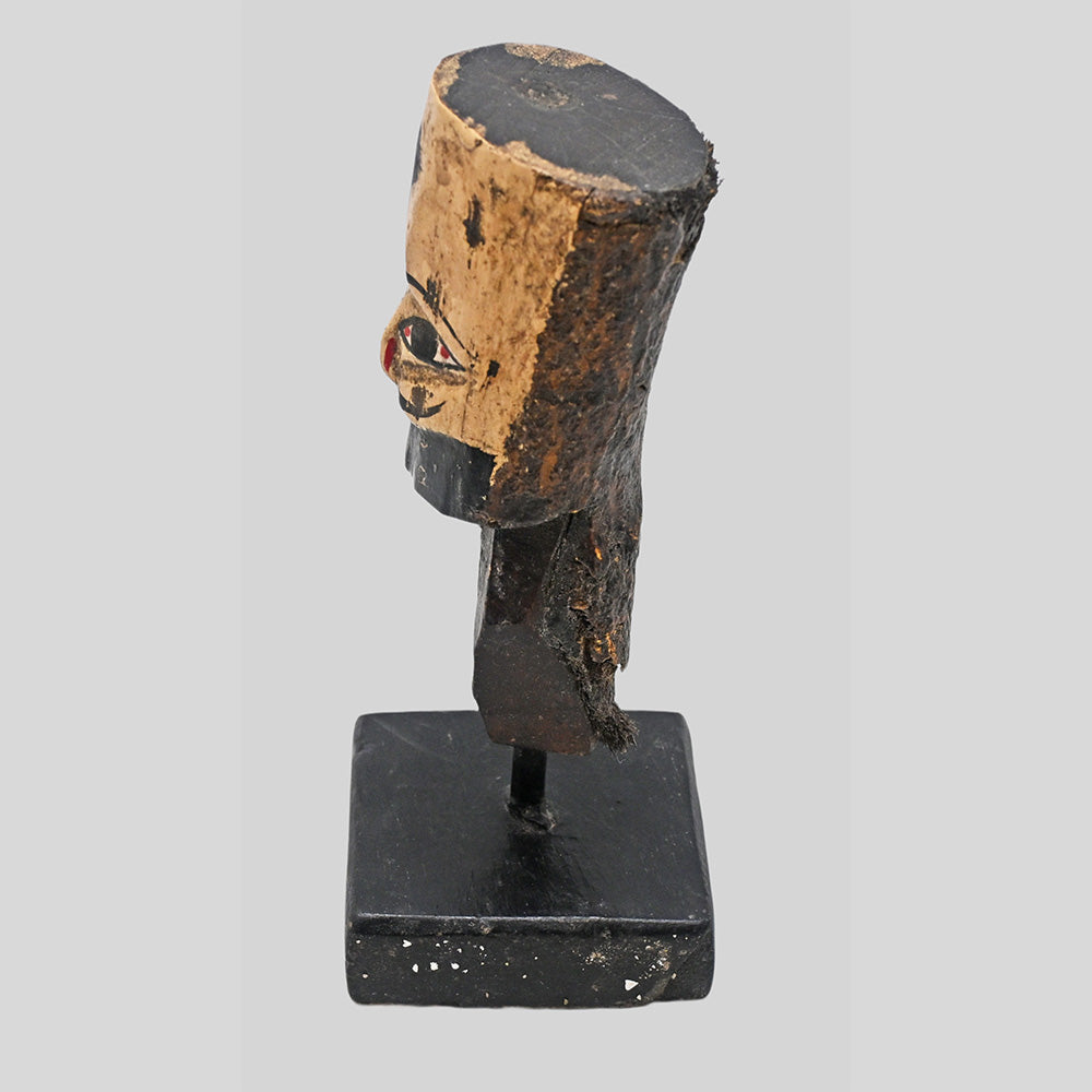Side view of handcrafted tribal king bust sculpture