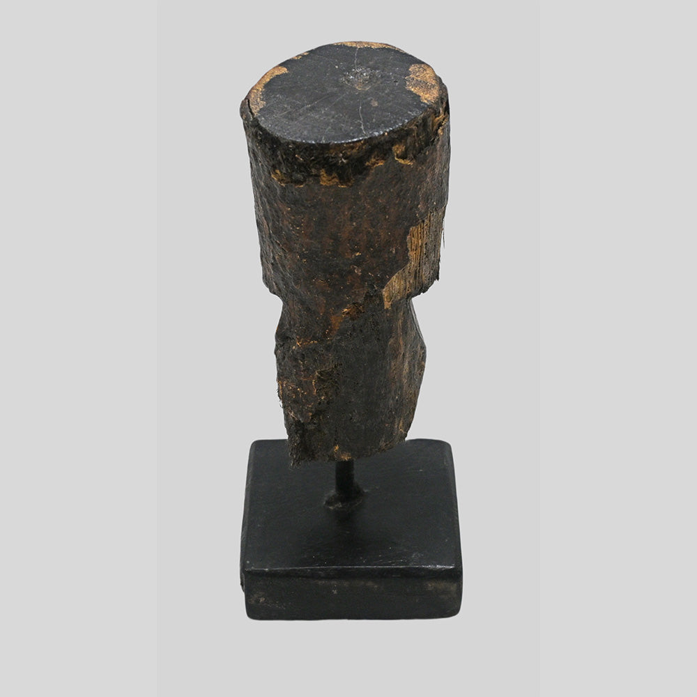 Alternate view of wooden tribal mask bust on display stand