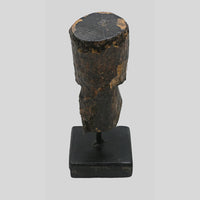 Alternate view of wooden tribal mask bust on display stand