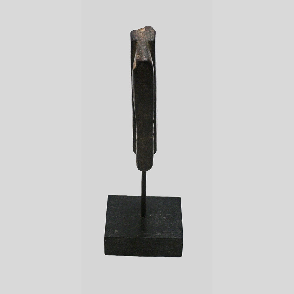 Detailed view of carved surface and rustic texture on wooden block