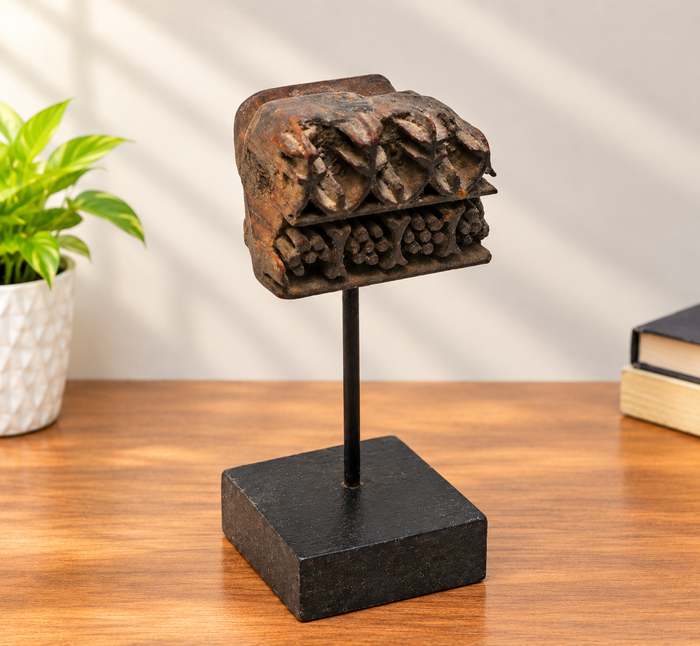 Intricate floral teak wood textile printing block on stand, front view