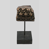 Close-up of intricate floral carving on teak wood printing block