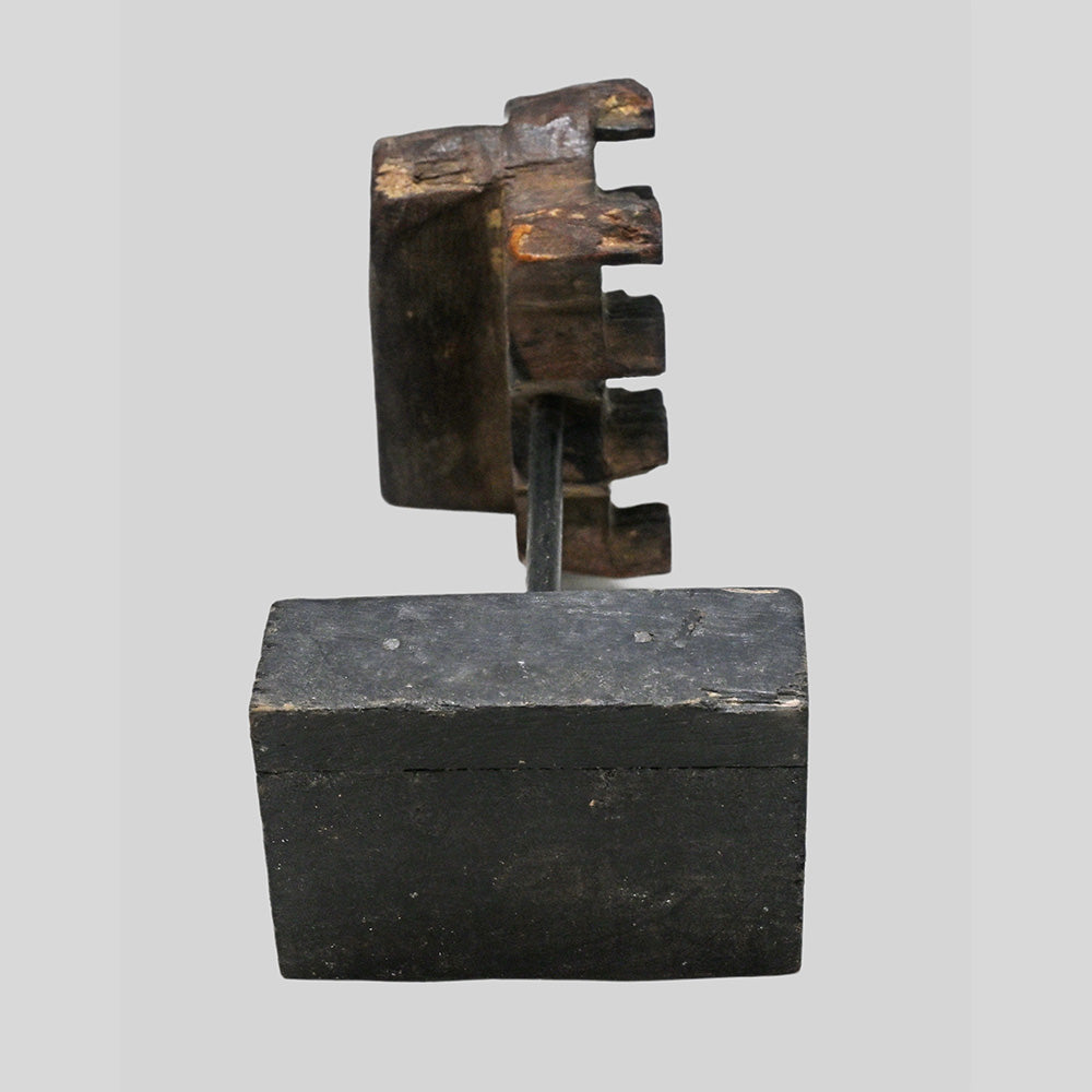 Alternate view of vintage carved wooden printing block on stand