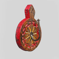 Angled view of red and brown wooden wall key hanger