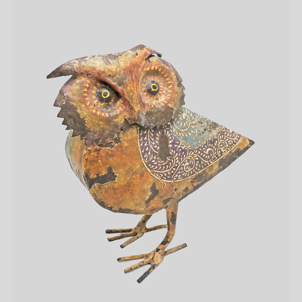 Iron owl figurine, angled view