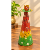Hand-painted iron folk art candle holder, front view