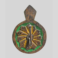 Floral carving detail on hand-painted wooden wall hook