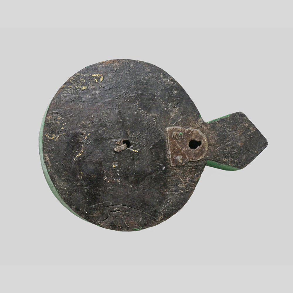 Floral detail on wooden wall hook with iron hanger
