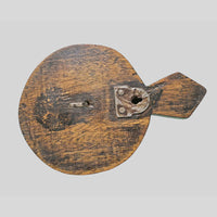 Floral detail on handcrafted green wall hanger