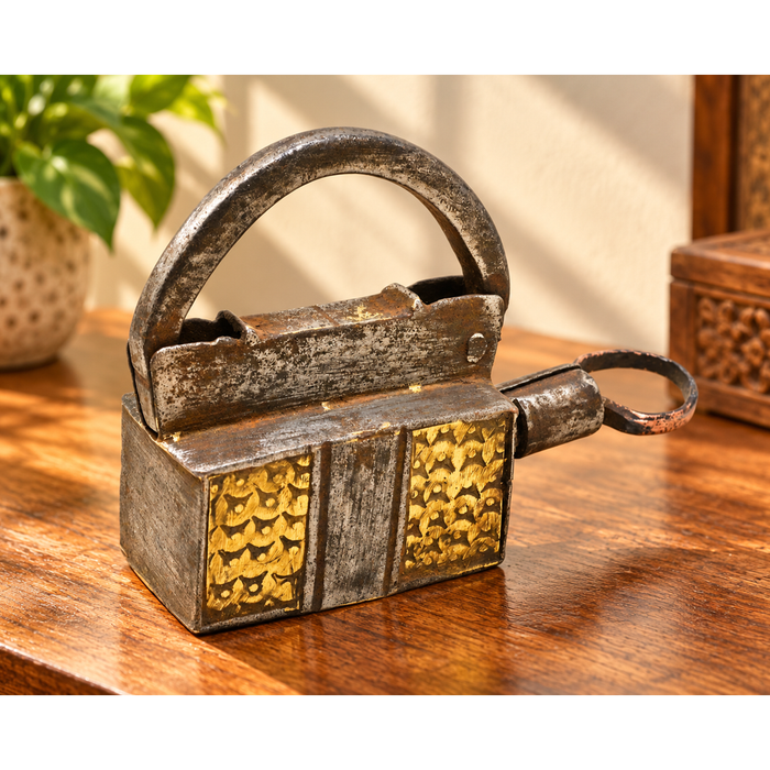Antique iron spring padlock with original key, front view