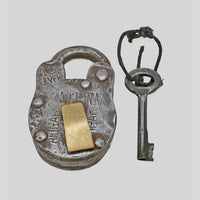 antique 10-lever iron padlock with original key, close-up detail