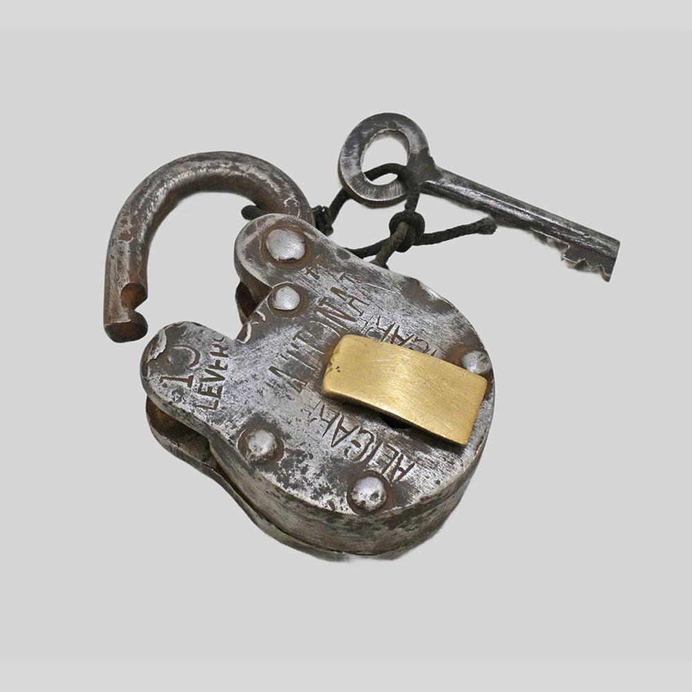 antique 10-lever iron padlock with original key, finish detail