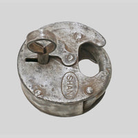 antique Aligarh iron padlock with original key, side view