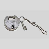 antique Aligarh-style iron padlock with key, alternate angle