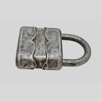 antique German iron padlock with key and rustic finish, side view