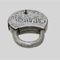 antique round iron padlock with silver finish and key, finish detail