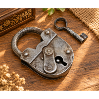 antique iron 2 Touren padlock with key, front view