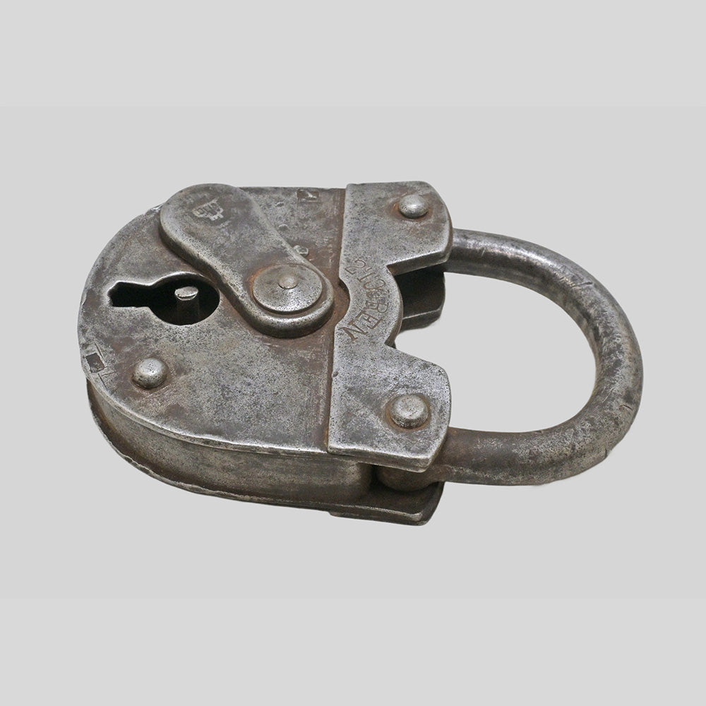 antique iron 2 Touren padlock with key, side view