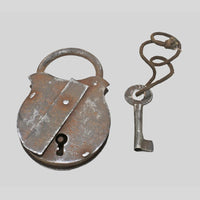 antique Aligarh iron padlock with key, close-up detail