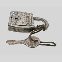 Antique Baldur padlock with key, side view